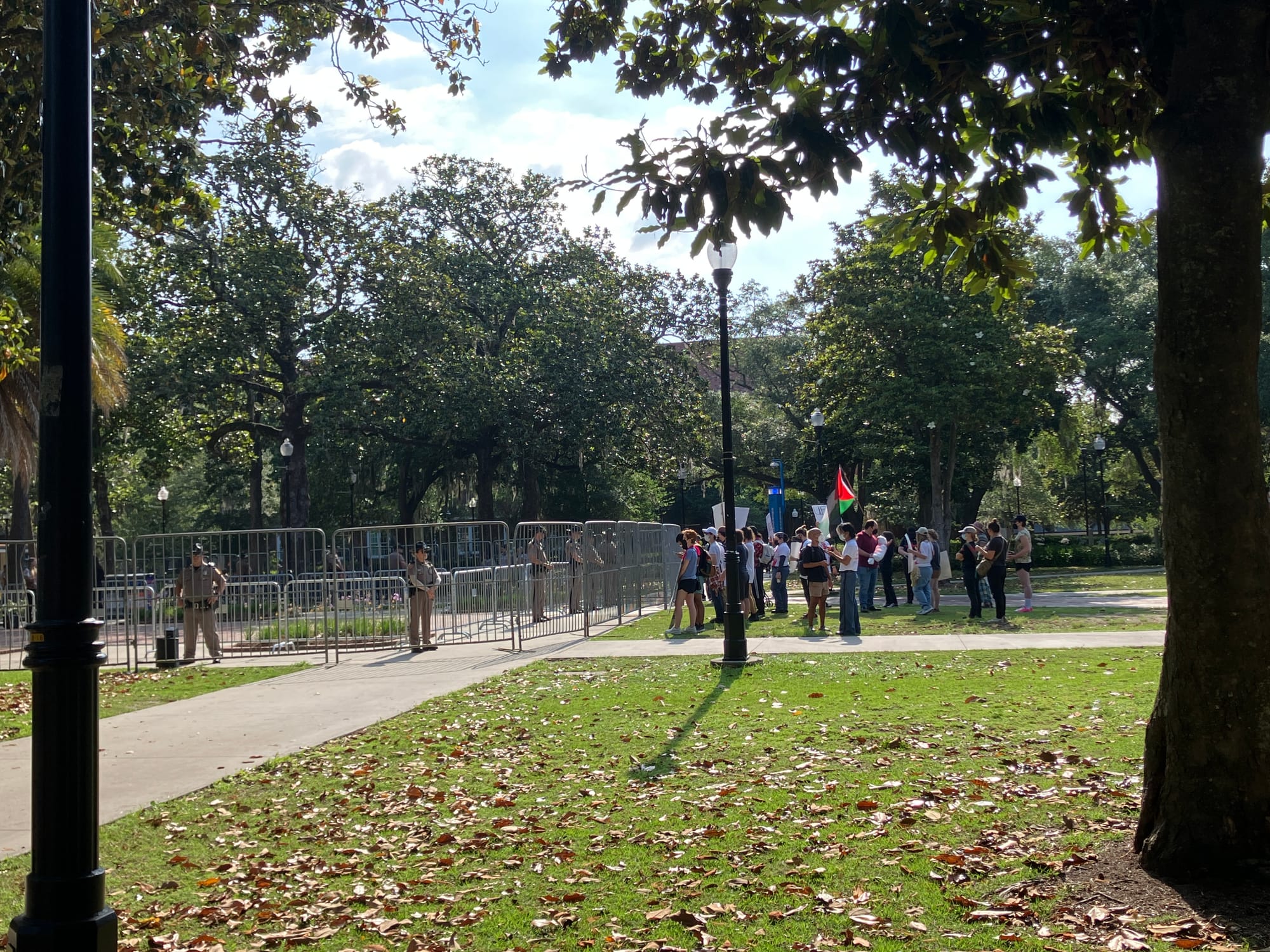 Press Conference For Gov. DeSantis Being Set Up in Front of Pro-Palestine Protesters